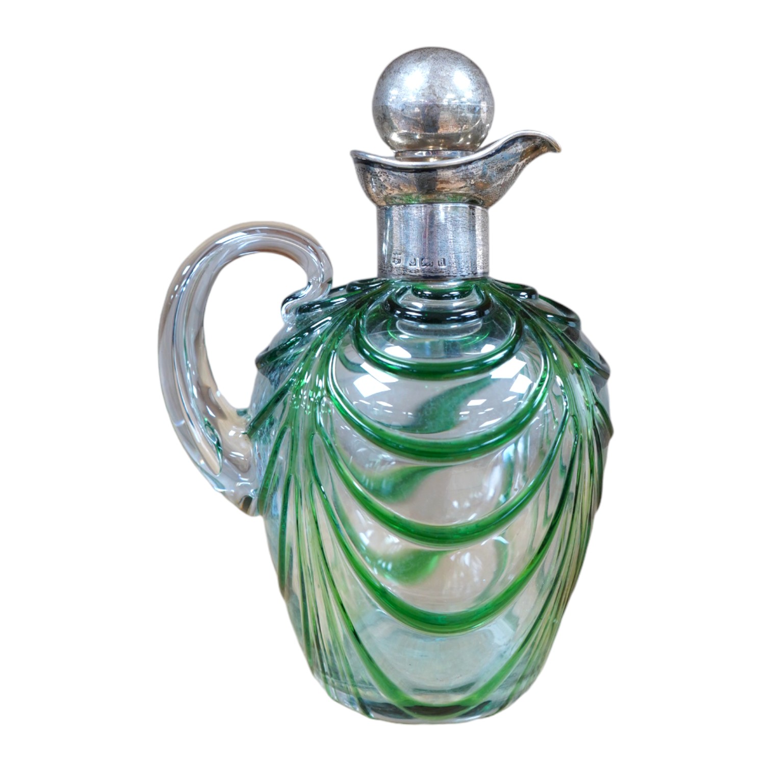 An Art Nouveau silver mounted green overlaid glass liqueur jug, David & Maurice Davis, Birmingham 1904, 20cm high. Condition - good